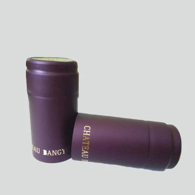 Capsule di vino termoretraibili in PVC di colore viola con striscia a strappo